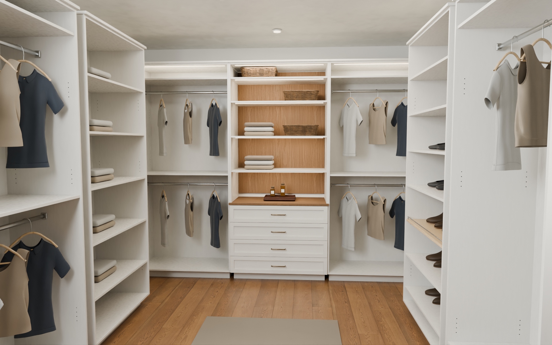 Fitted walk-in closet with open hanging sections and illuminated shelving
